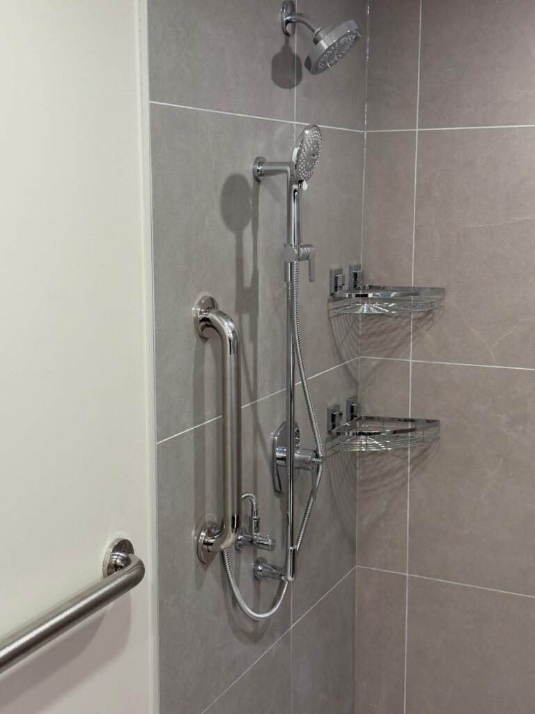 ADA-compliant bathroom transformation in Vancouver with walk-in shower and grab bars