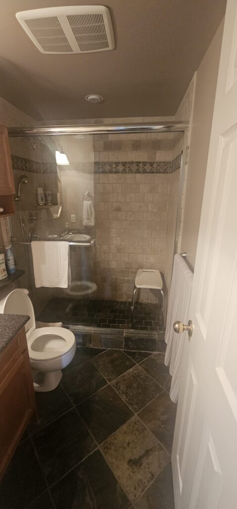 Bathroom remodel for seniors with ADA accessibility features and walk-in shower